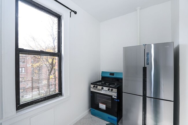 Building Photo - 11525 Metropolitan Avenue, 233