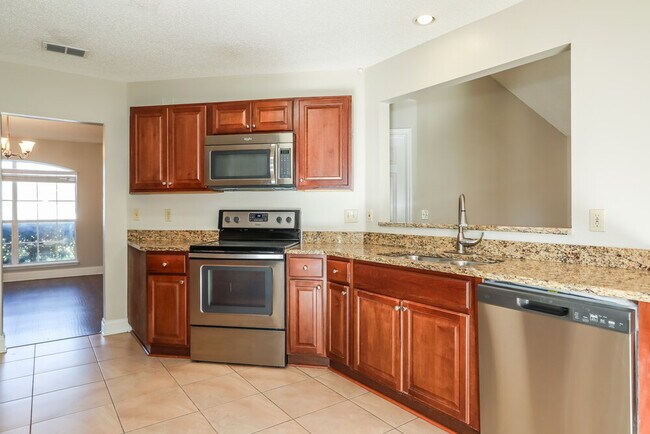 Building Photo - 8244 International Village Dr