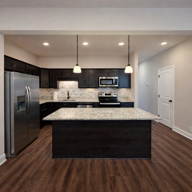 Building Photo - $250 OFF Move In Special! - Modern 3 Bedroom Townhome in Prime Location