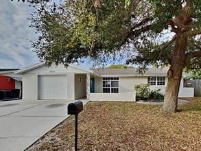 Building Photo - Charming 3-Bed, 2-Bath Home in Port Richey with Garage