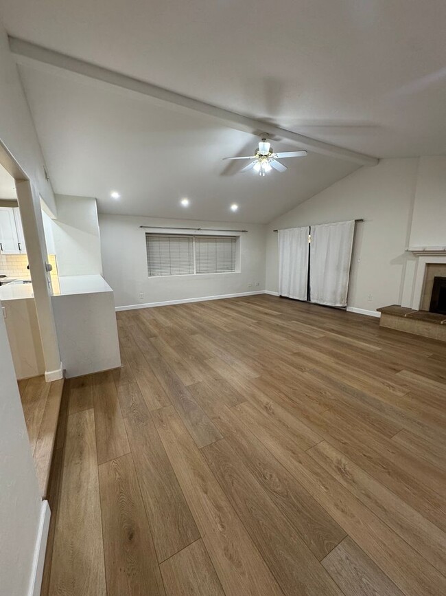 Building Photo - Beautifully Remodeled Home With Front & Si...