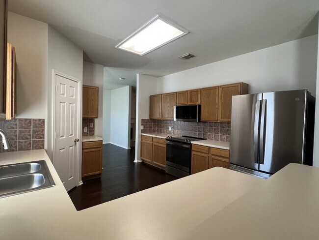 Building Photo - Charming 3-Bed /2 -Bath Sanctuary with Fireplace & Hardwood Floors, Between Evans and Bulverde at...