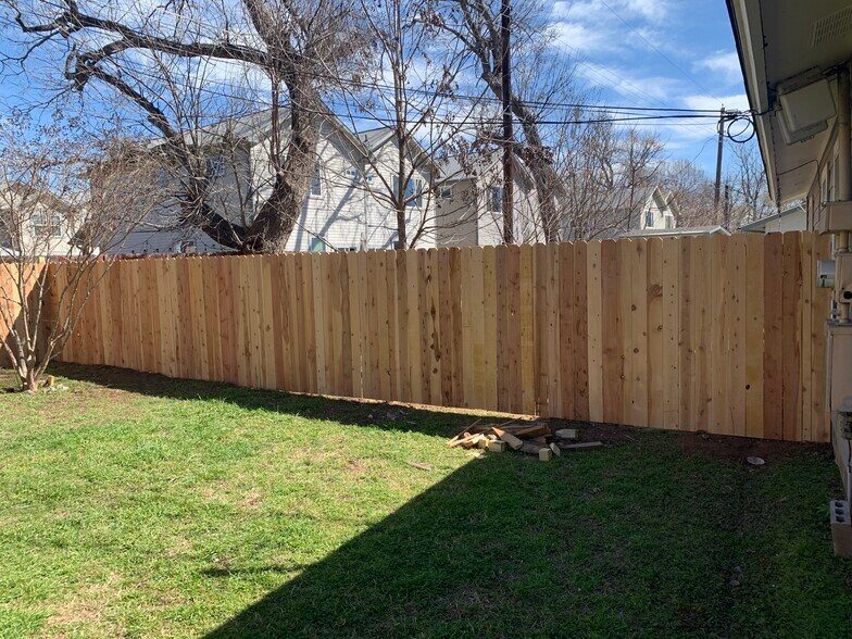 Fence dividing Duplex's rear yard w/neighbors - 5802 Tracy Lynn Ln