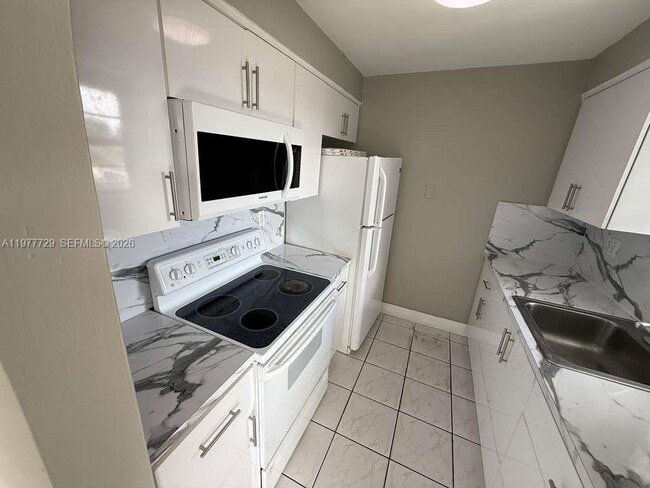 Building Photo - 7105 W 13th Ave