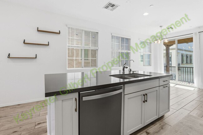 Building Photo - Modern Gilbert Lakeview Townhome in The La...