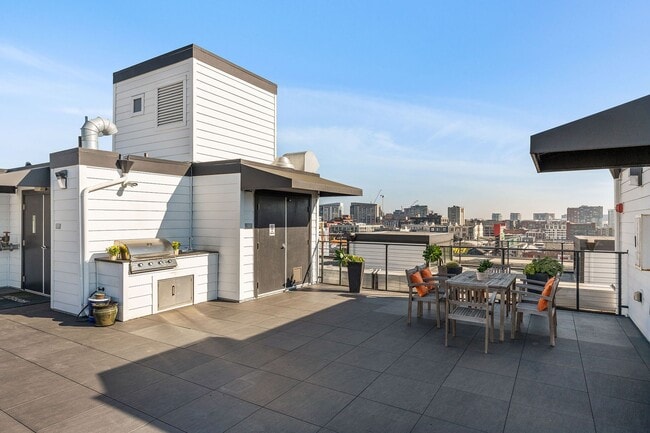 Building Photo - SoMA: Stylish 1 Bed Condo w/ Designer Finishes, Google Fiber, Bike Storage & Shared Roof Deck
