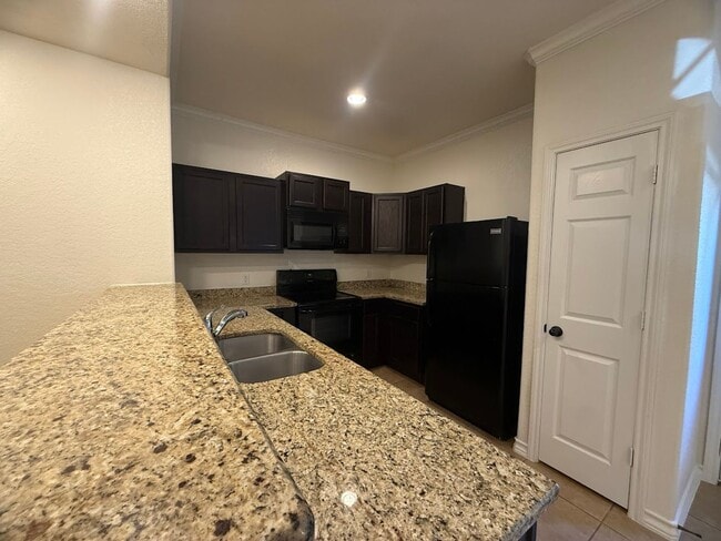 Building Photo - Townhome Near Retama Park...No Carpet.