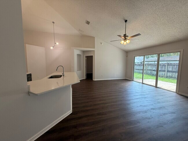 Building Photo - 5458 Hidden Gardens Dr