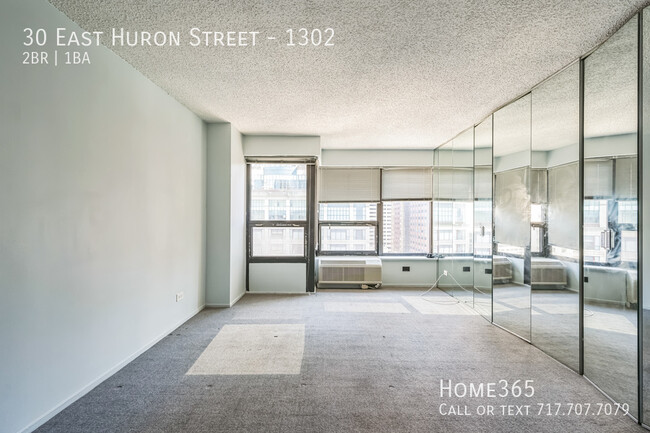 Building Photo - Modern 2-Bed, 1-Bath Condo in the Heart of...