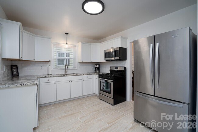 Building Photo - 3227 Mayfield Ave