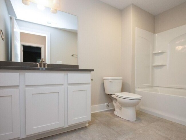 Building Photo - Four Grand Brownstones - Ranch Plan