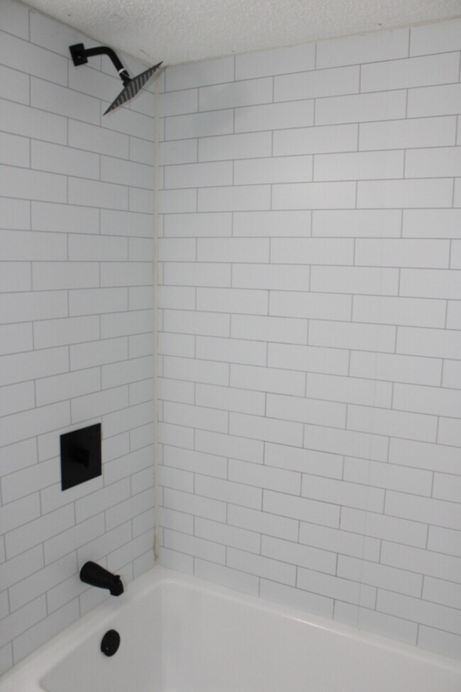 Building Photo - Move in Special - Spacious 5 Bedroom and 2...