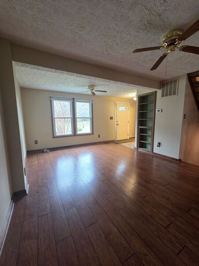 Building Photo - Serene Living in a Quiet Lakeside Community