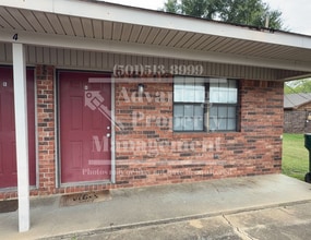 Building Photo - Showings Available!