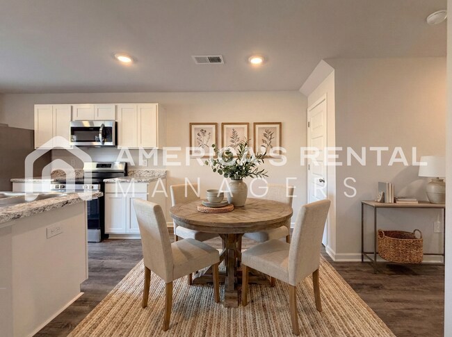 Building Photo - Spacious Two-Story Townhome with Open Layout!