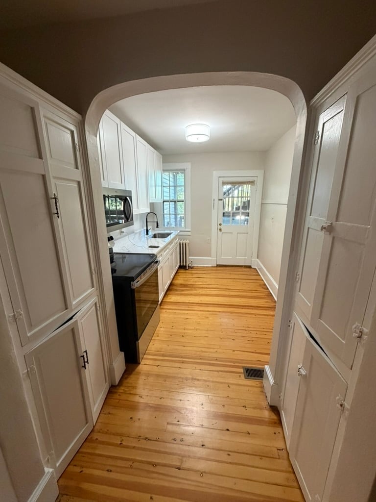 Entry to kitchen with double-sided pantry - 2521 Longview Ave SW