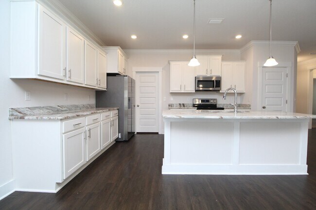 Building Photo - 3BR/2BA Cantonment New Construction Townhome with 2-Car Garage, Granite Kitchen & Low-Maintenance...