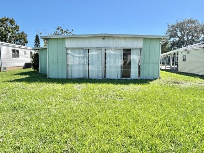 Building Photo - Unfurnished 2 Bedroom Manufactured Home in Barefoot Bay Available Now!