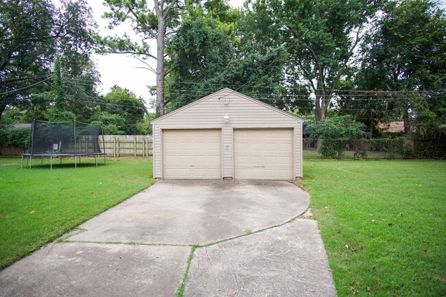 Building Photo - Gorgeous duplex unit on large lot with garage -- NO PETS ALLOWED