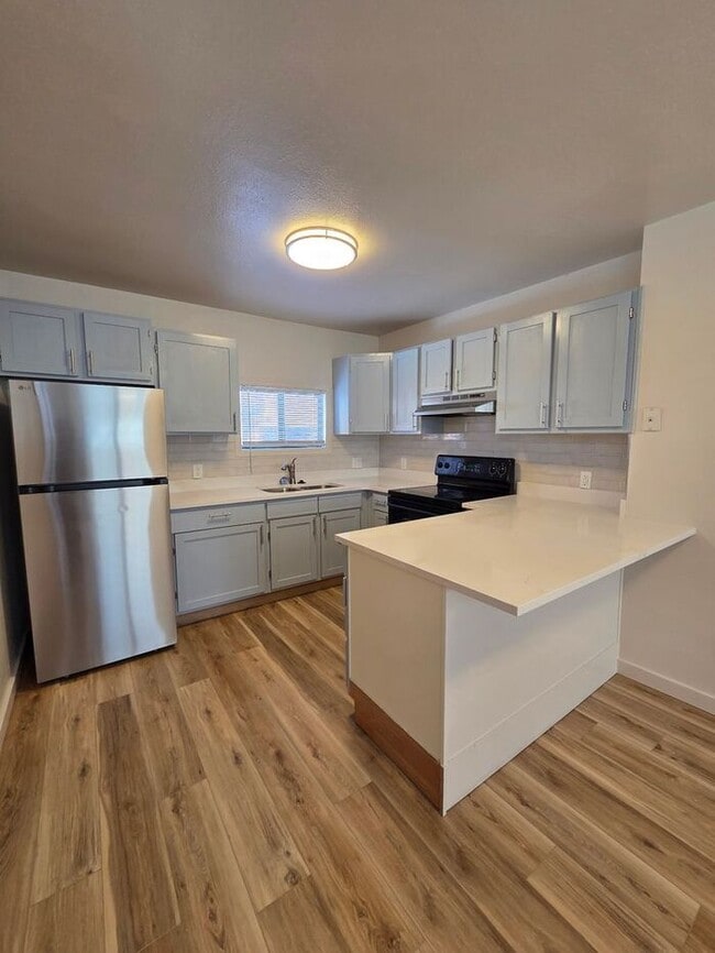 Building Photo - Renovated Cozy 2-Bedroom Duplex | Move In Now – Next Month’s Rent is Waived!
