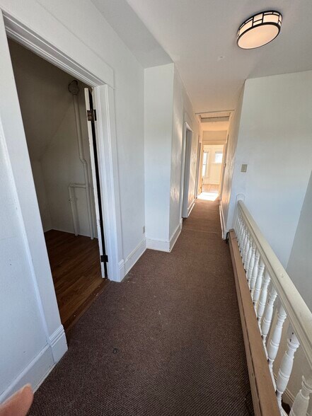 2nd floor hallway, Master at end, Bed 1 and 2, small storage/bed - 10 E Nelson St