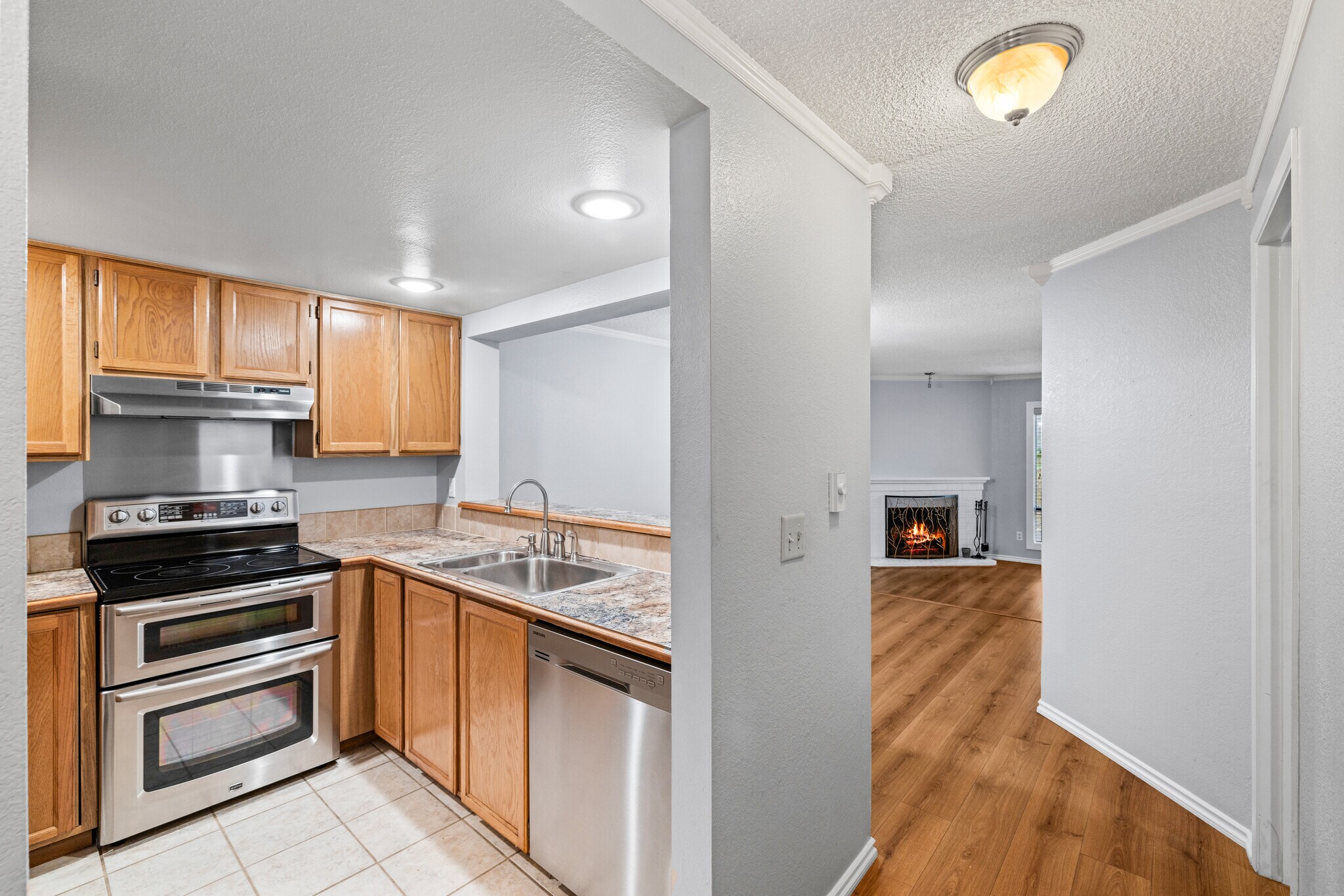Kitchen with view of living room - 130 SW 116th St