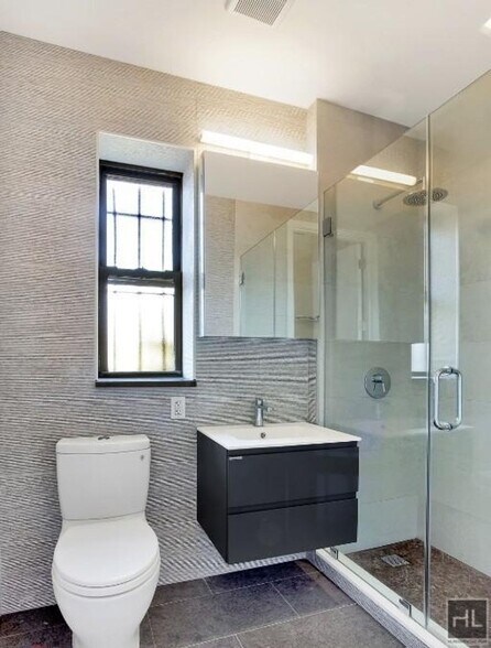 Building Photo - Renovated Lower East Side 1-Bedroom with M...