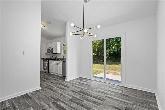 Building Photo - 5142 Huxley Rd