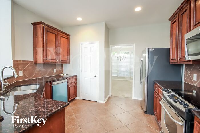 Building Photo - 7407 Pony Creek