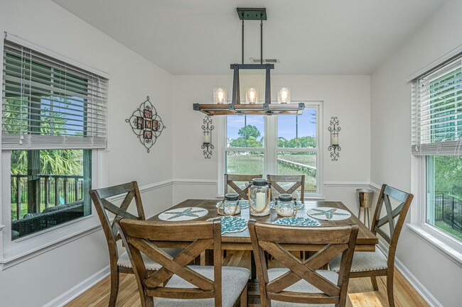 Building Photo - Gorgeous 4 BR/2BA Marshfront Home With Cre...
