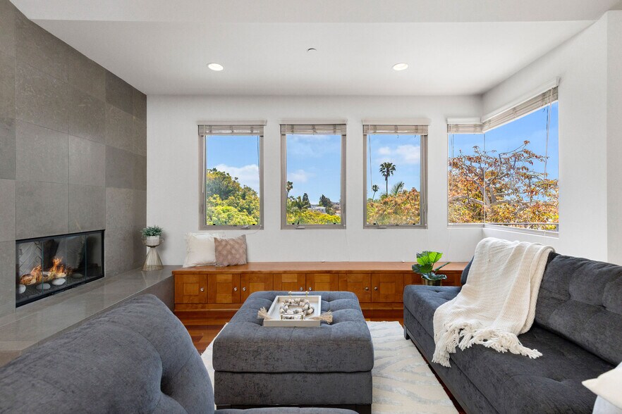 Staged living room area with fireplace - 1542 Manhattan Beach Blvd