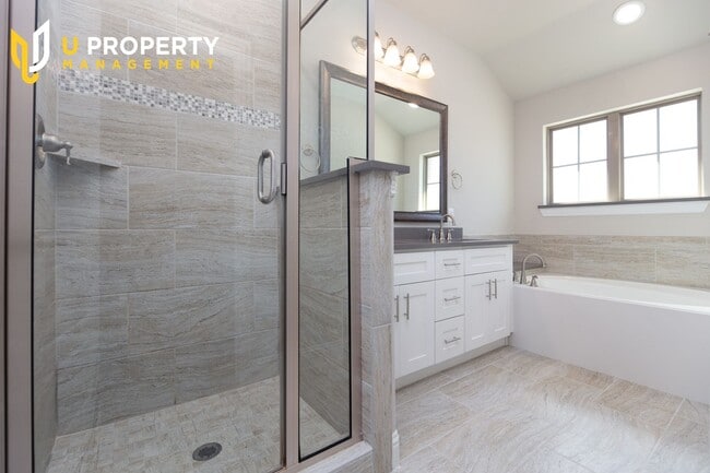 Building Photo - Luxury Townhome- wood flooring. Great location