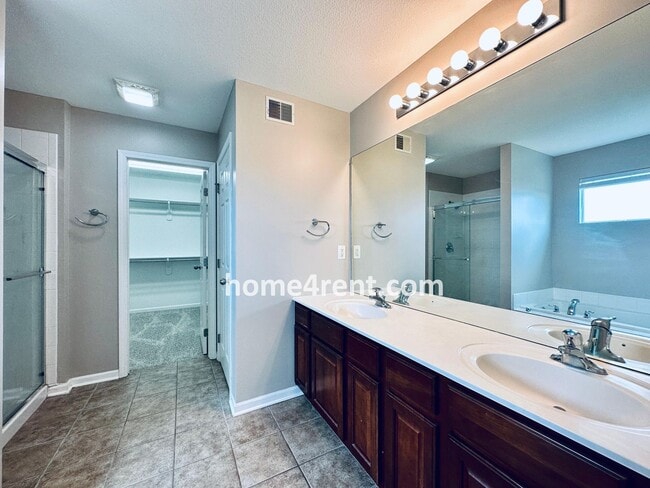 Building Photo - Wood Floors, Open Layout, Plenty of Natura...