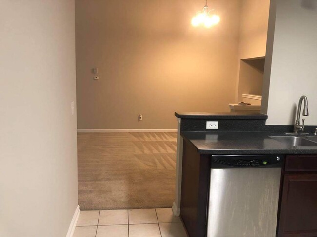 Entrance to kitchen from dining area - 13800 Herons Landing Way