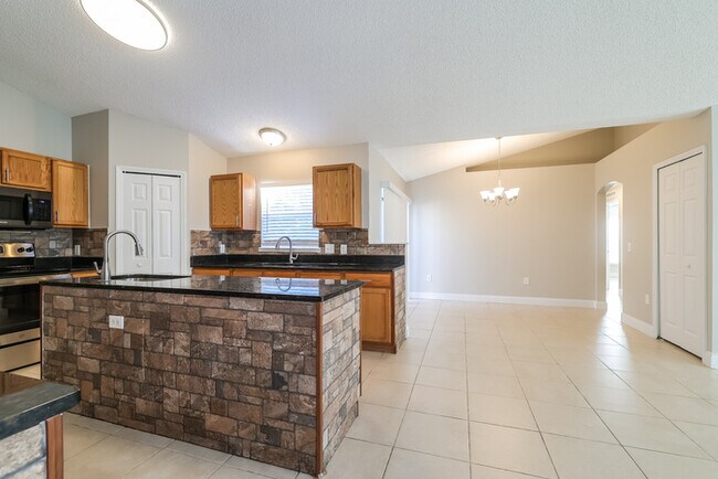 Building Photo - Spacious Comfort Meets Modern Touches