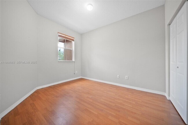 Building Photo - 4970 White Mangrove Way E