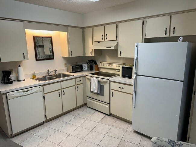 Building Photo - Experience Maintenance-Free 55+ Living at The Cove at Tavares Village!