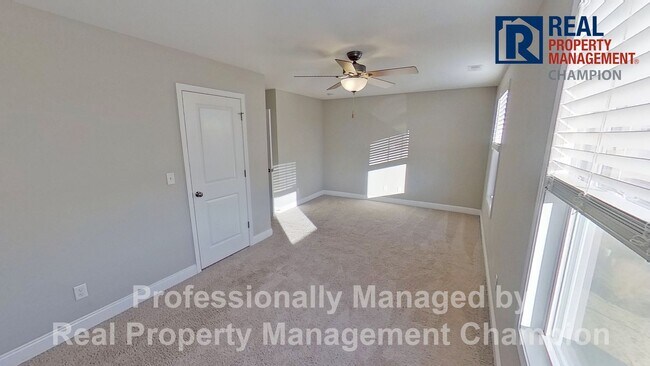 Building Photo - Spacious Home with Fenced Yard