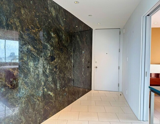 Building Photo - Designer Luxury. Iconic Views. Extraordinary Living.