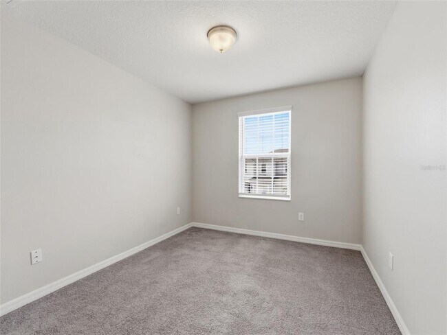 Building Photo - 7052 Grand Elm Dr
