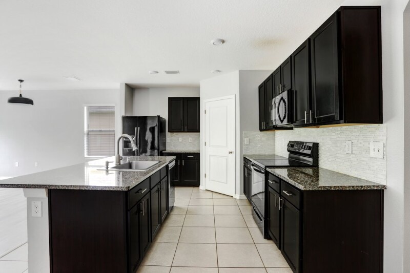 Building Photo - 6866 Wagon Trail St