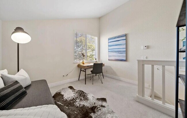 Building Photo - 1 bedroom plus loft features a functional floorplan with high ceilings