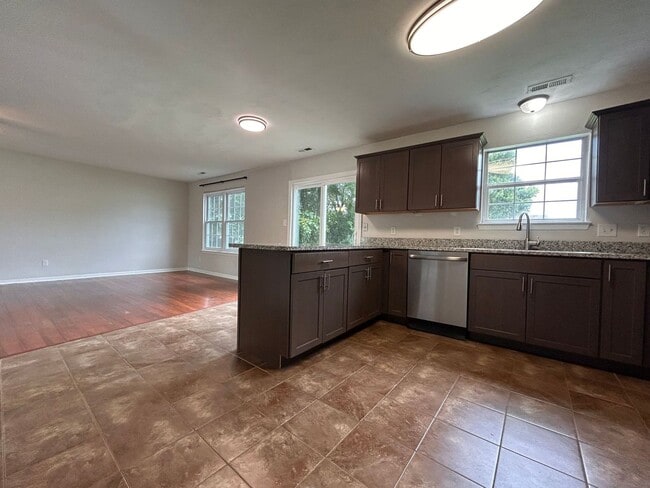 Building Photo - Spacious & Updated 4-Bedroom Gem in the He...