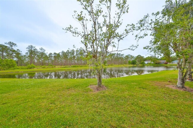 Building Photo - 9481 Highland Oak Dr