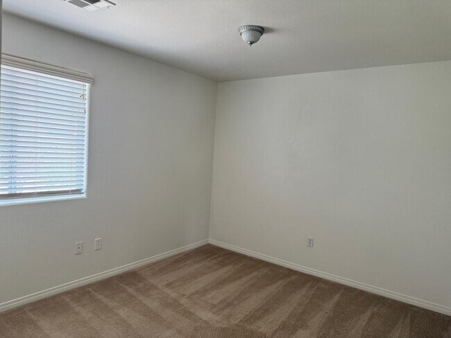 Building Photo - 5665 Rose Tiara Dr
