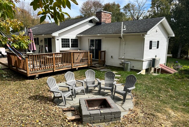 Outdoor living space complete with fire pit patio area - 1138 Western Ave