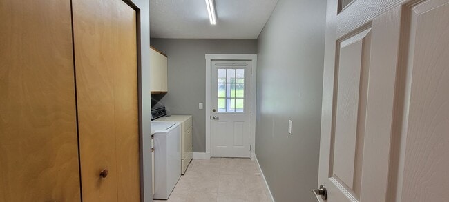 Building Photo - Beautiful home with peek a boo views of West Bay on Old Mission Peninsula