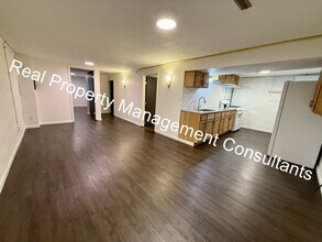 Building Photo - Cozy 2-Bedroom Lower-Level Home – All Util...