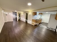 Building Photo - Cozy 2-Bedroom Lower-Level Home – All Util...