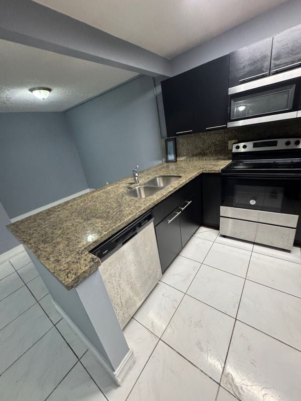 Building Photo - 5955 NW 25th Ct